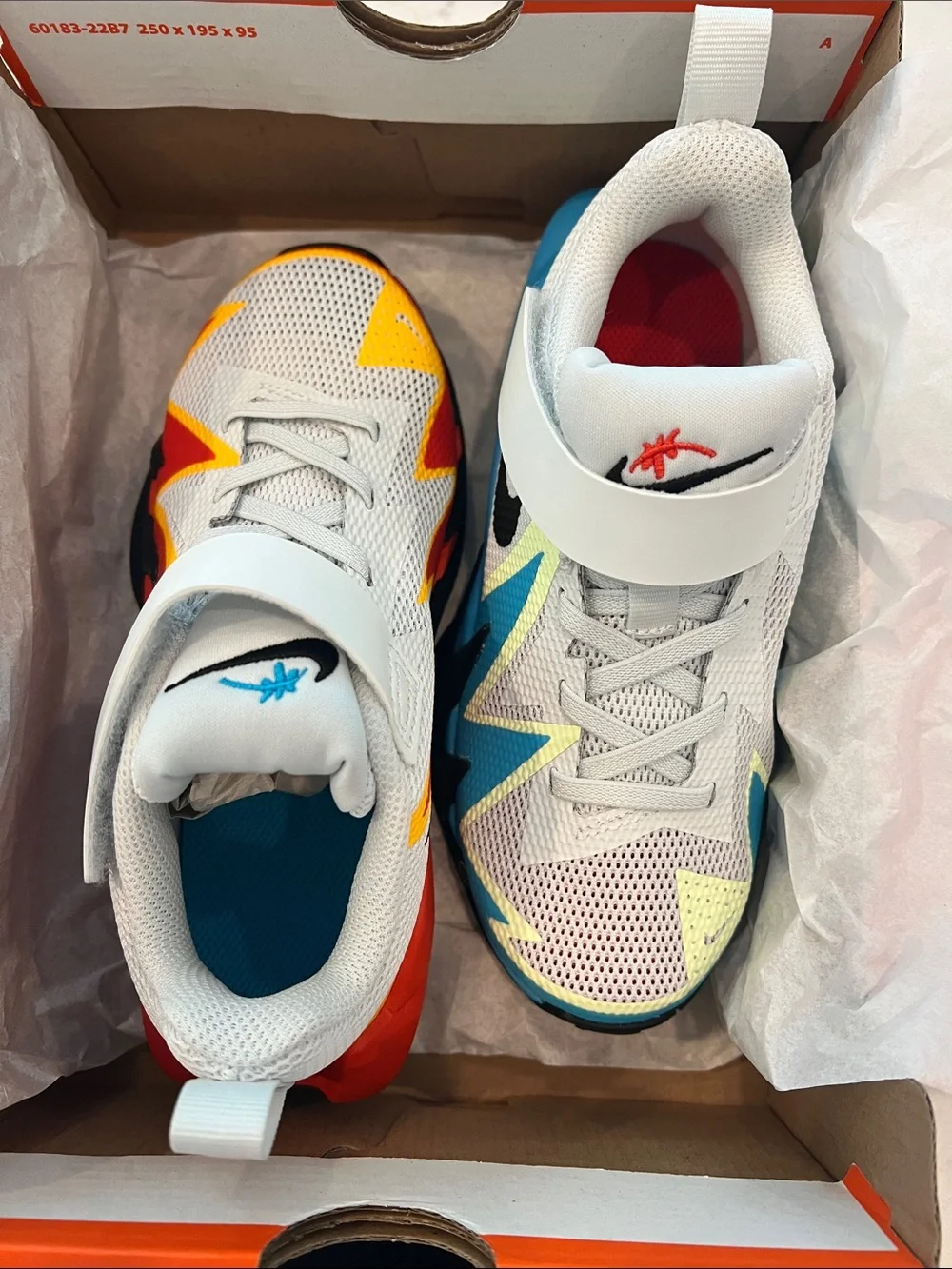 Nike Kids Dynamite Sneakers in White with Red and Blue Accents